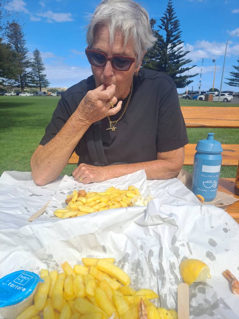 Mum eating GF DF Fish and Chips at Victor Harbor near Adelaide, Australia